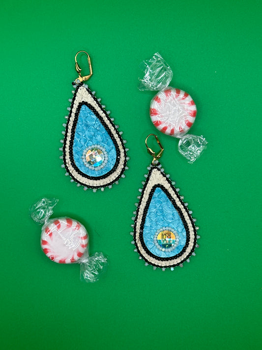 Sky blue teardrops with iridescent centers