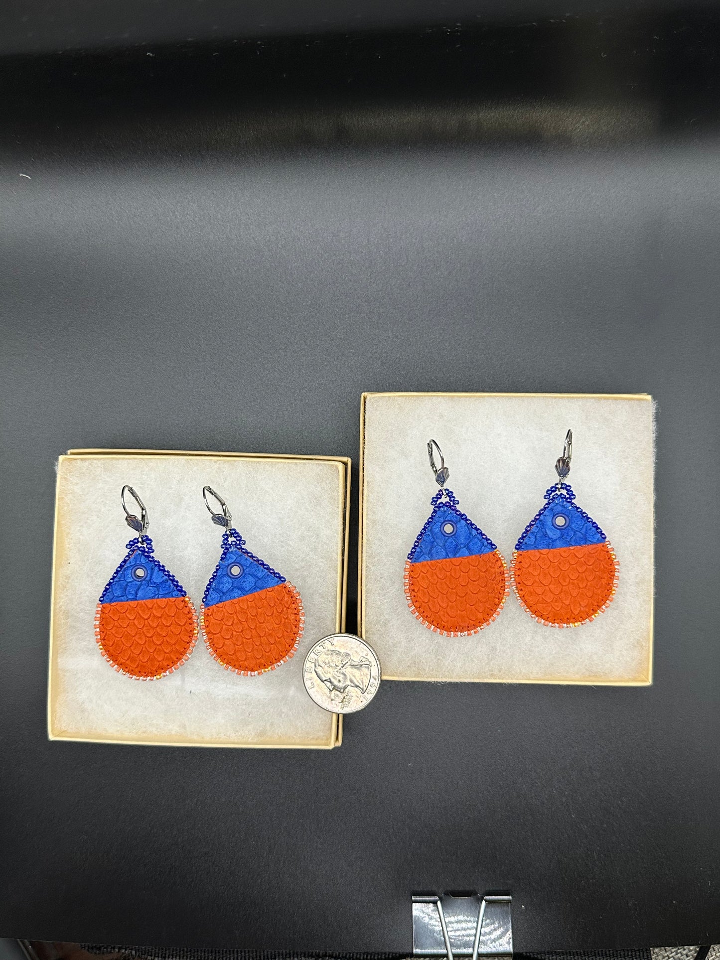 Small buoys made with dyed Salmon skin.