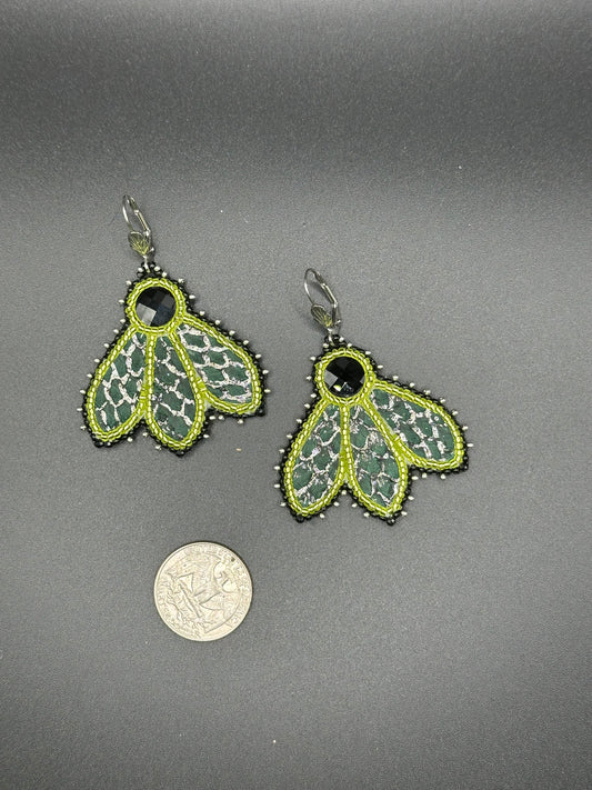 Green earrings made with salmon skin